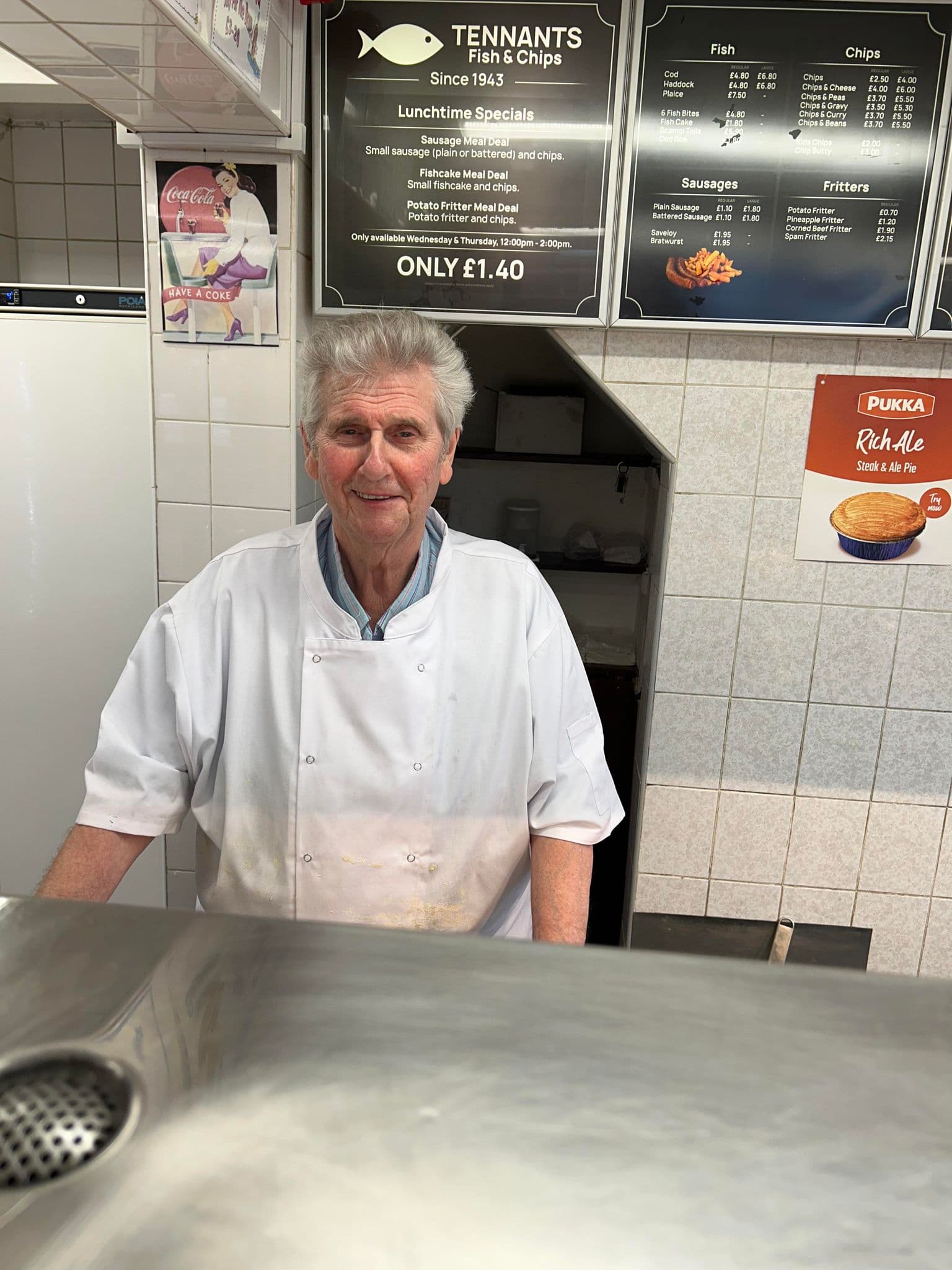 A photo of Gary Tennant behind the fryer.