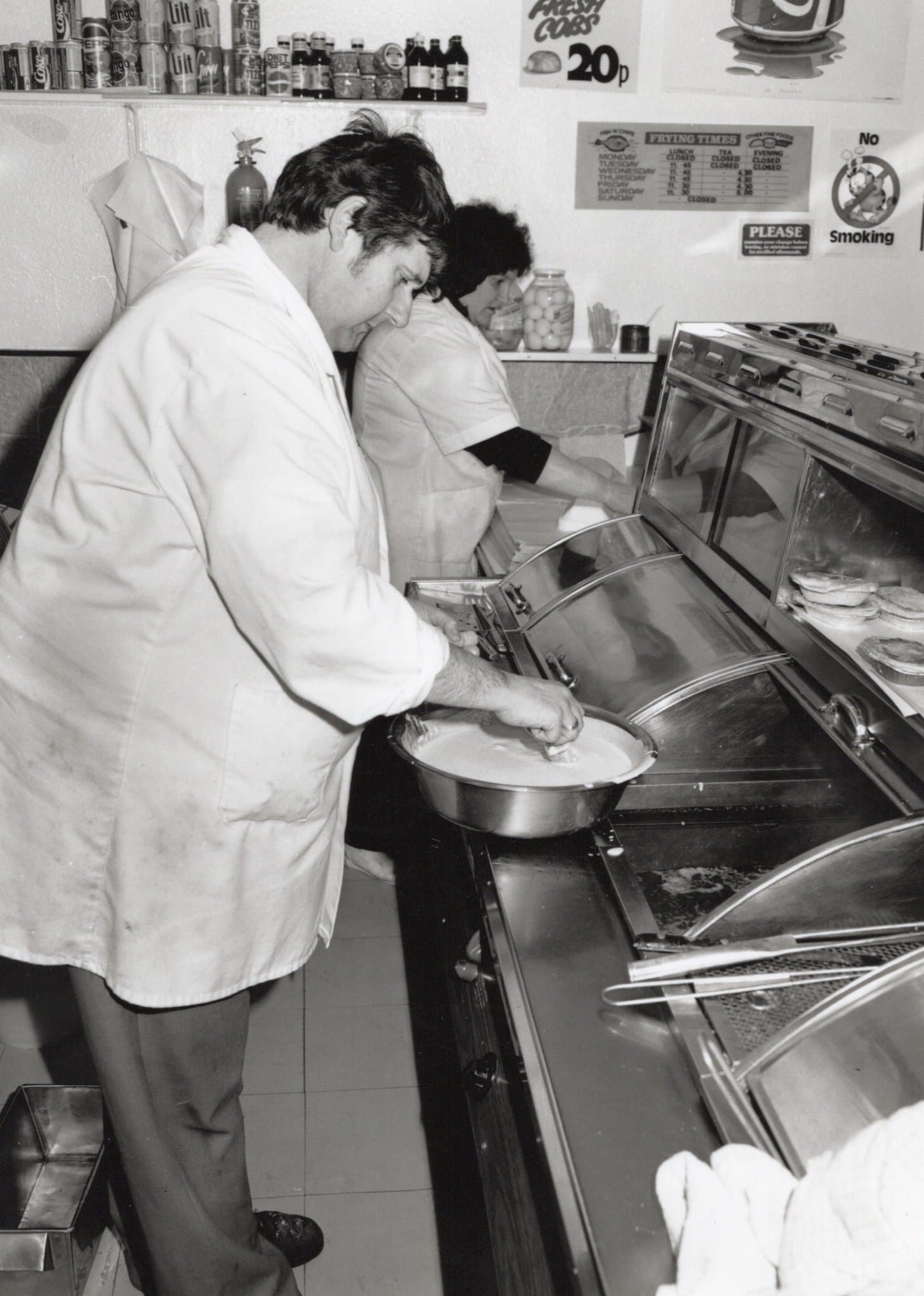 Gary & Joan Tennant serving customers.